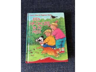 Kinderboeken Kwispelstaartjesboek: een krokodil in de heg ( Carry Slee )