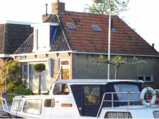 Huizen te koop Te koop  Nes- Akkrum AAN OPENBAARVAARWATER . Gezin-Senior Wooning