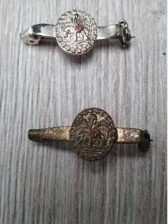 draagspeld rode kruis (logo zwaan)