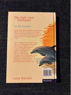 Jeugdboeken Op zoek naar dolfijnen: reis, gevaar,  storm, jungle