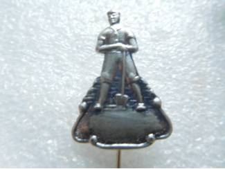 speldje man met schop