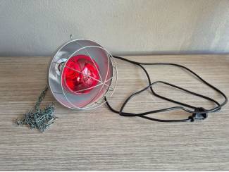 Warmte lamp en piekstok