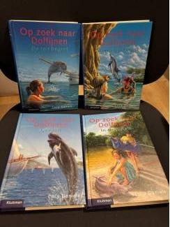 Jeugdboeken Op zoek naar dolfijnen : storm op komst ( 10+) Lucy Daniels