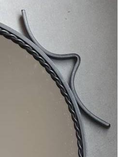 Curiosa smeedijzeren spiegel