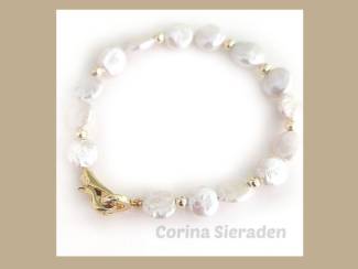 Armbanden Armband van parels en vergulde accenten