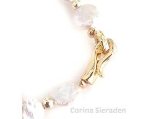 Armbanden Armband van parels en vergulde accenten