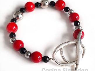 Armbanden Armband van rode koraal en onyx