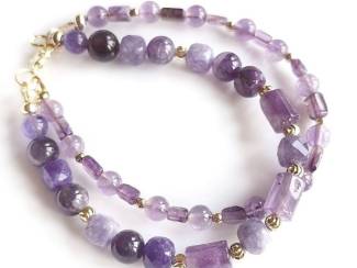 Armbanden Armband van amethist en vergulde accenten