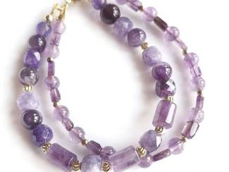 Armbanden Armband van amethist en vergulde accenten