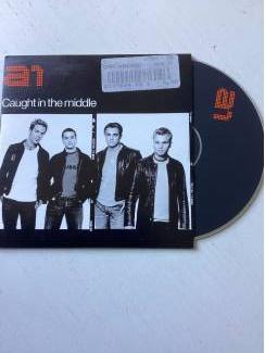 A1 - Caught in the middle