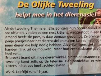Kinderboeken De Oljke Tweeling helpt mee in het dierenasiel