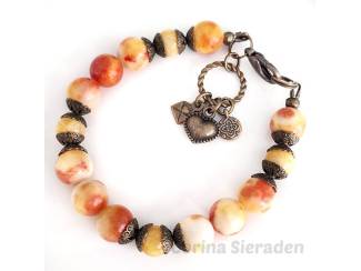 Armband van persian jade, topaas jade en brons