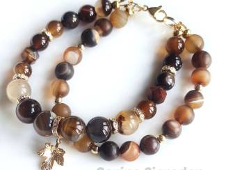 Dubbele armband van striped agaat en vergulde accenten