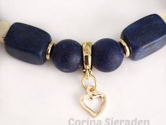 Armbanden Armband van lapis lazuli en vergulde accenten.